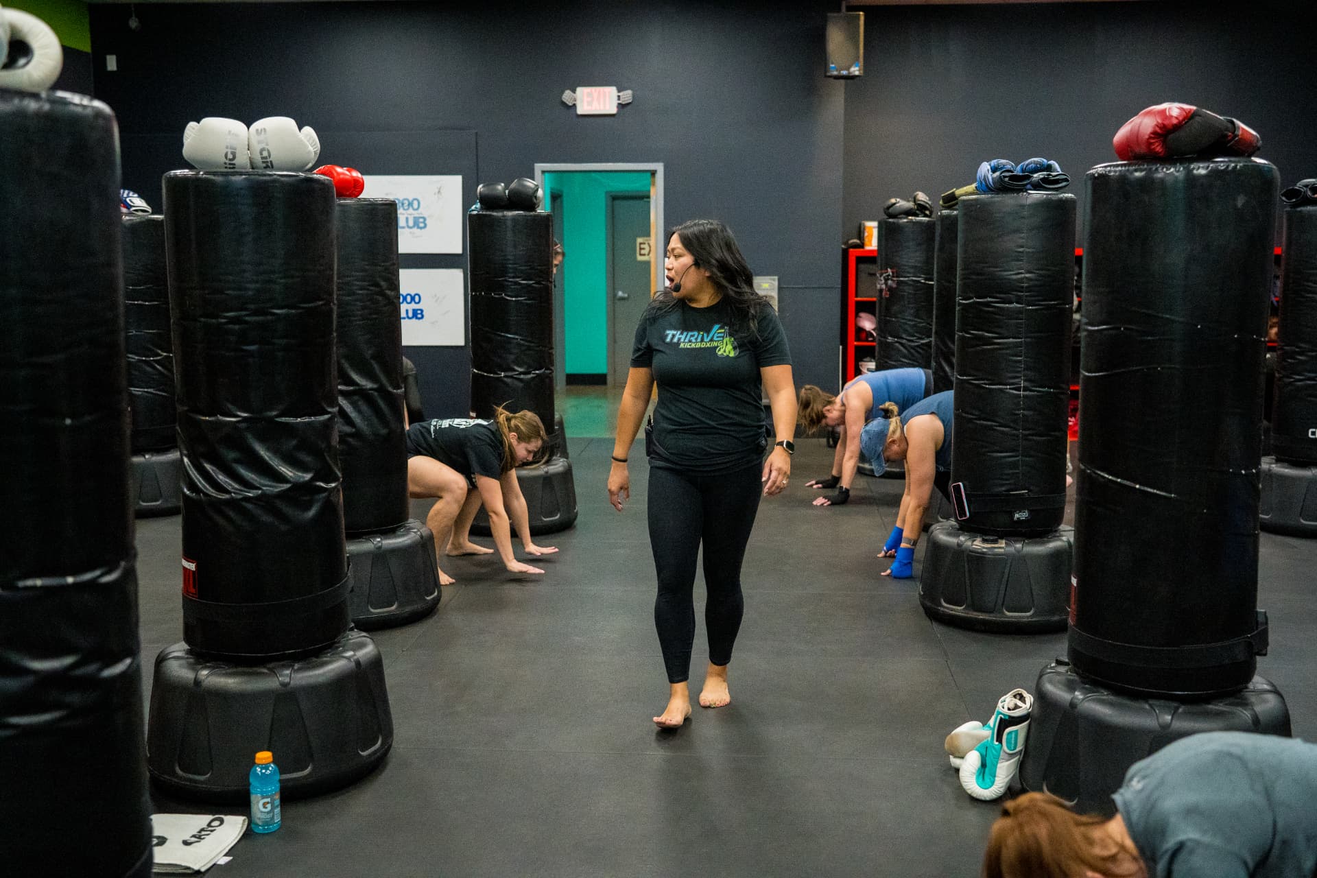 Thrive Kickboxing instructor coaching a class in the Las Vegas studio
